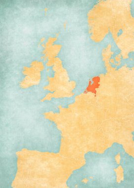 Hollanda, Batı Avrupa haritasında suluboya resimli eski bir kağıt gibi yumuşak grunge ve vintage tarzında yer alıyor.