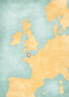 Guernsey, Batı Avrupa haritasında suluboya resimli eski bir kağıt gibi yumuşak grunge ve vintage tarzında yer alıyor..