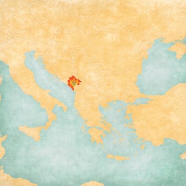 Karadağ, Balkan haritasındaki bayrağı suluboya resimli eski bir kağıt gibi yumuşak grunge ve vintage tarzıyla boyadı. 