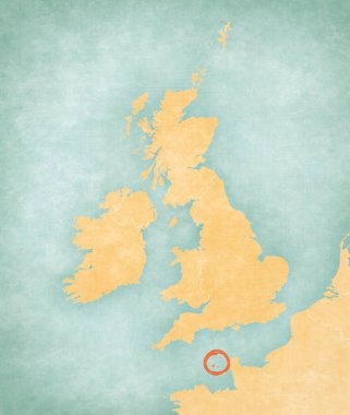 Guernsey on the map of British Isles in soft grunge and vintage style, like old paper with watercolor painting. clipart