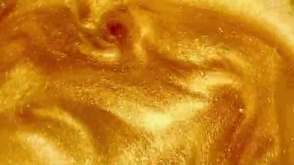 Liquid Gold Motion Organic Background Shine Glitter Fluid Metallic Yellow — Wideo stockowe