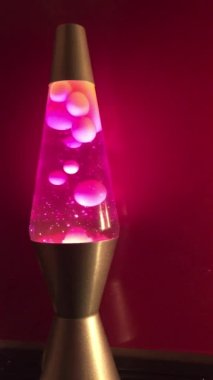 Lava lambası 70 'lerin tarzında pembe lav sıvısı arkaplan görüntülerinde fotokopi alanı var.