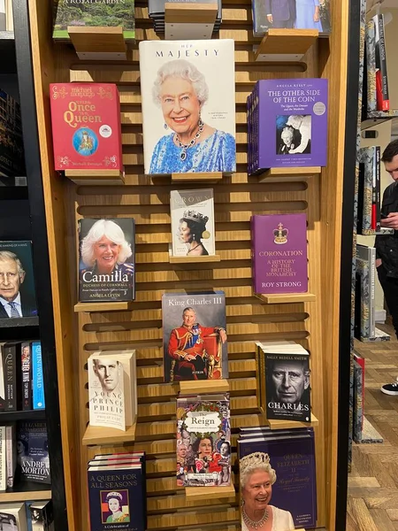 Stock image London, UK - 01.04.2023: Book shop with books of royal family king Charles iii, queen Elizabeth, Camilla, Prince William and Prince Harry before coronation fever