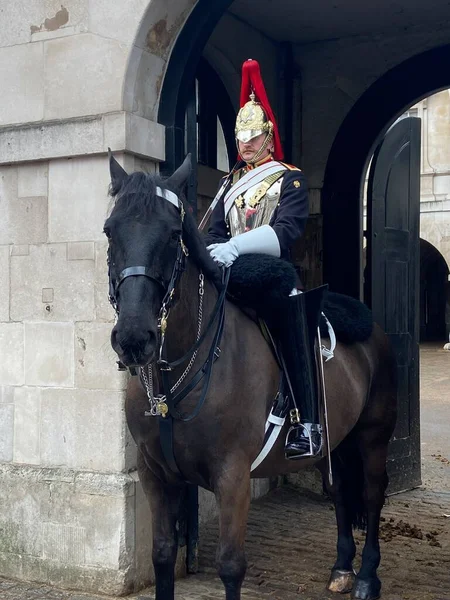 stock image LONDON, ENGLAND UK - March 20, 2023: Royal horse guards military cavalry soldiers at the Buckingham Palace  on 2023, England, UK