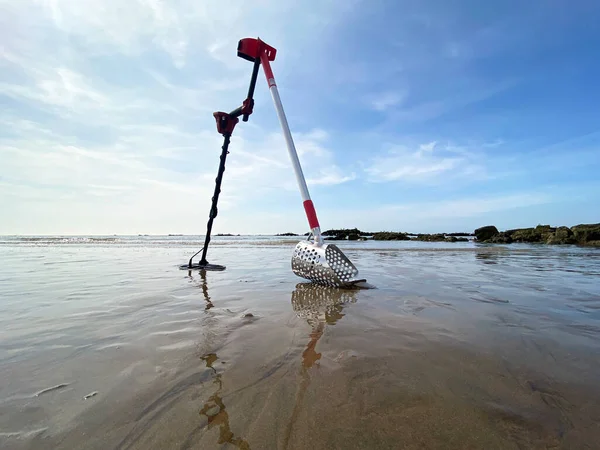 stock image sand scoop metal detecting metal detector beach stock photo