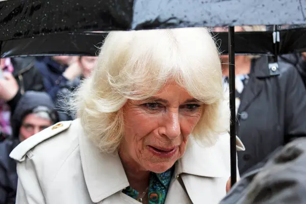 stock image Rye, East Sussex, UK- 16.05.2024: Queen Consort Camilla visits Rye Church and Lamb house to celebrate Literature history meets crowds in the rain 