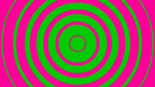 中心からピンクの線状円を大きくアニメーション化 緑の背景に隔離されたフラットベクトルイラスト — ストック動画