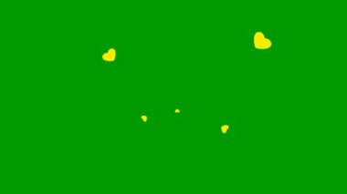 Animated background with yellow hearts fly from center. Concept of love. Hearts isolated on green background.