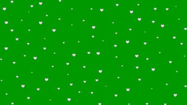 Animasyon pembe kalpler tepeden tırnağa uçuyor. Döngülü video. Yeşil arka planda izole kalp yağmuru