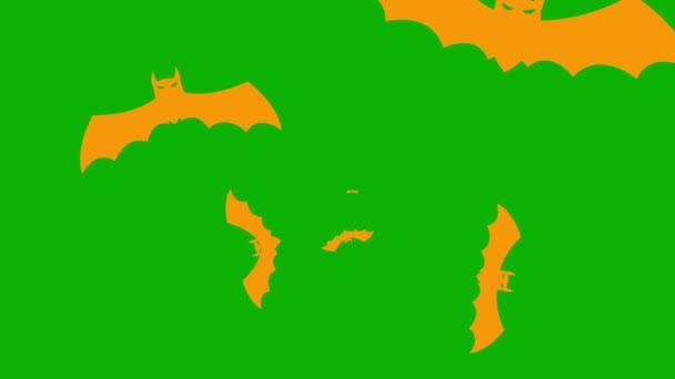 アニメーションされたオレンジ色のコウモリはスクリーンの中心から飛び出します ループされたビデオ ハロウィーンのコンセプト ブラックフライデー 緑色の背景に単離されたフラットベクターイラスト — ストック動画