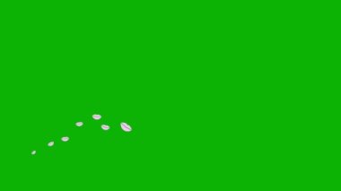 Canlı pembe dudaklar bir dalgada sağdan sola uçar. Öpüşme, aşk, tutku kavramı. Yeşil arkaplanda izole edilmiş kalpler.