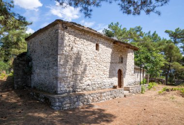 Old church in the little island of lake Pamvotida, Ioannina, Greece clipart