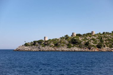 The old windmills of Kioni village, Ithaca island, Greece clipart