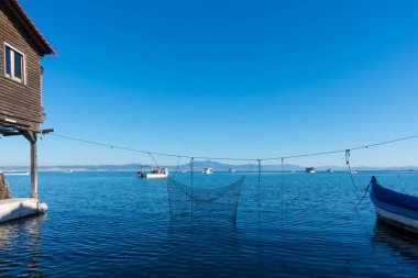 The area at the delta of river Axios in the Thermaic gulf, Thessaloniki, Greece, where there are fishermen's cabins clipart