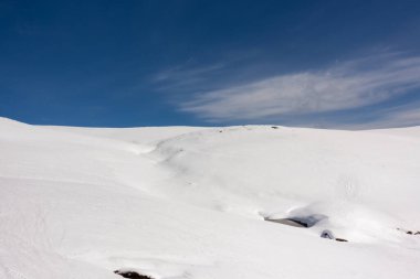 Breathtaking scenery on the snowy slopes of Kaimaktsalan ski center, Edessa, Greece clipart