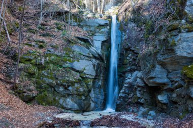 Amazing scenery by the little waterfall of Kagia, Panagitsa village, Pella, Greece clipart