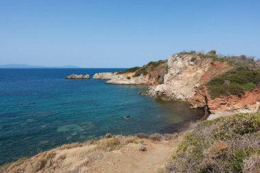 Amazing scenery by the sea in North Evia, Greece, on Agios Vasileios bay, close to Agia Anna clipart