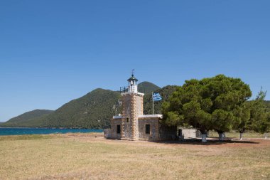 The beautiful lighthouse in Vasilina, North Evia, Greece clipart