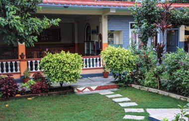 A beautiful spring garden and pathway near a house in India