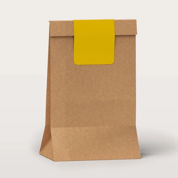 Beyaz Arka Planda Sarı Etiketli Kahverengi Eko Çanta — Stok fotoğraf