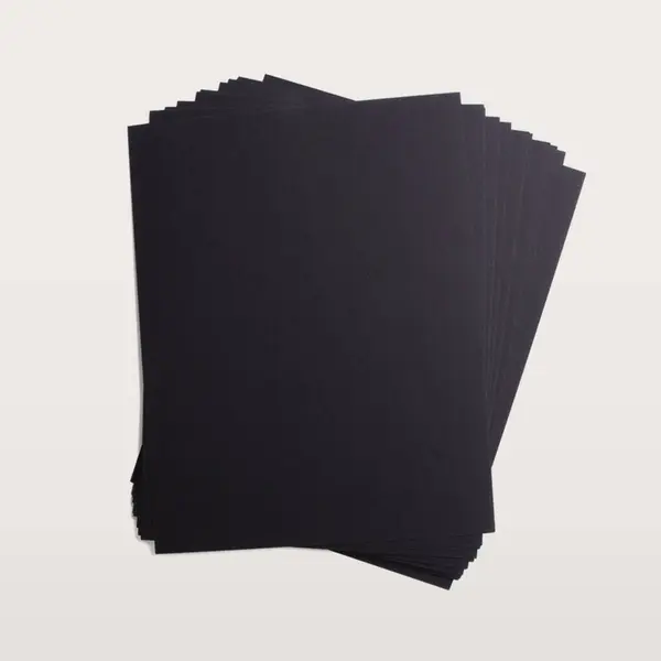 Black Papers Flat Lay Concept Isolated White Background — Stock Photo, Image