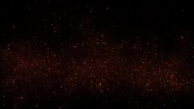 Parlak toz parçacıklarının etrafa saçıldığı karanlık bir görüntü. Parçacıklar gizemli ve büyüleyici bir görsel efekt yaratırlar, parıldayan ışıklarla dolu yıldızlı bir gece gökyüzünü hatırlatırlar..