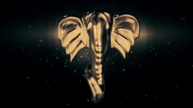 Koyu arkaplanda parlayan parçacıklar olan altın fil kafası heykeli