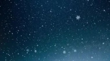 Düşen kar taneleriyle soyut kış arkaplanı.