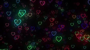 Karanlık bir arkaplanda renkli kalpleri olan soyut bir arkaplan.