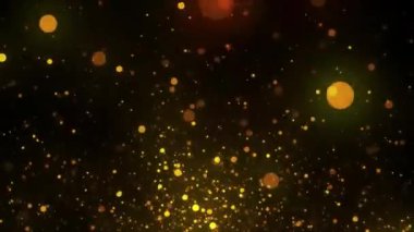 Altın bokeh ışıklarıyla soyut arkaplan ve siyah arkaplanda parlayan parçacıklar.
