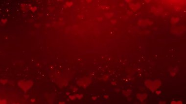 Odaklanamayan kalp şekilleri ve parıldayan ışıklarla soyut kırmızı arkaplan.