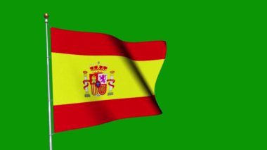 Yeşil arka planda rüzgarda dalgalanan bir İspanyol bayrağı.