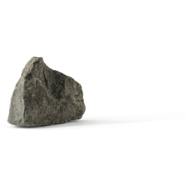 Doğanın hammaddesini sembolize eden, gölgesi olan basit, dokulu bir kaya..