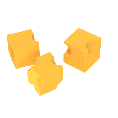 Üç sarı peynir şekilli blok, büyük ihtimalle oyun ya da eğitim amaçlı kullanılıyor..