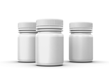 Vidalı üç boş beyaz şişe, genellikle ambalaj malzemeleri veya ilaçlar için kullanılır..