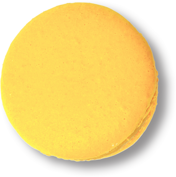 Pürüzsüz yüzeyini ve yuvarlak şeklini sergileyen parlak sarı bir badem kurabiyesi genellikle tatlı bir ziyafet olarak görülür..