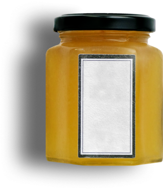 Altın maddeyle dolu, muhtemelen bal ya da şurup dolu, kişiselleştirme için boş etiketli temiz bir kavanoz..