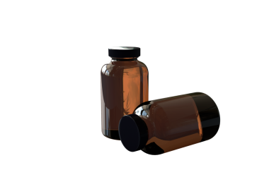 İki kehribar cam şişe, biri dik ve biri eğimli, muhtemelen ilaç veya takviye için..