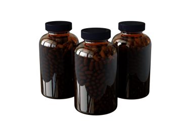 Kahverengi kapsüllerle dolu üç şeffaf kavanoz, muhtemelen takviye maddeler veya ilaçlar..