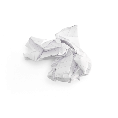 Çöpe atılmış fikirleri ya da yaratıcı süreci sembolize eden buruşuk bir kağıt parçası..