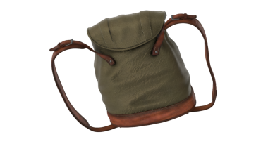 Seyahat sırasında veya dışarıda kişisel eşyalar taşımak için tasarlanmış deri kayışlı yeşil bir sırt çantası..