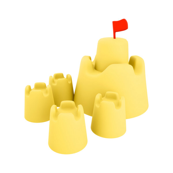 Küçük bir bayrağı olan renkli bir kumdan kale sahilde eğlence ve yaratıcılığı temsil ediyor..