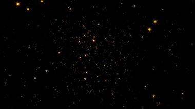 Altın parçacıklarının soyut arkaplanı.