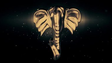 Koyu arkaplanda parlayan parçacıklar olan altın fil kafası heykeli