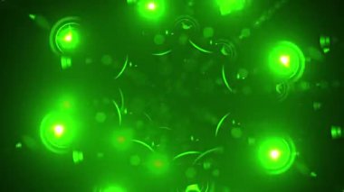 Siyah zemin üzerinde dairesel desenler olan yeşil ve sarı ışık patlaması