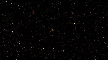 Kainatın güzelliğini gösteren çok sayıda yıldızı siyah bir zemin üzerinde tasvir eden geniş bir yıldız alanı..