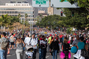 SANTA CRUZ DE TENERIFE, SPAIN - FEBRUARY 21, 2023: Coso parade - along the Avenida de Anaga, official end of Carnival. Again march carnival groups, floats, decorated cars and the Carnival Queens.
