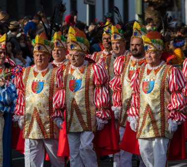 SANTA CRUZ DE TENERIFE, SPAIN - FEBRUARY 21, 2023: Coso parade - along the Avenida de Anaga, official end of Carnival. Again march carnival groups, floats, decorated cars and the Carnival Queens.