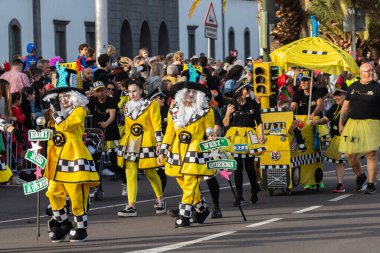 SANTA CRUZ DE TENERIFE, SPAIN - FEBRUARY 21, 2023: Coso parade - along the Avenida de Anaga, official end of Carnival. Again march carnival groups, floats, decorated cars and the Carnival Queens.