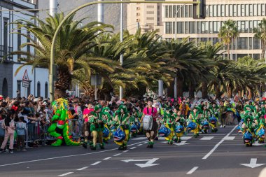 SANTA CRUZ DE TENERIFE, SPAIN - FEBRUARY 21, 2023: Coso parade - along the Avenida de Anaga, official end of Carnival. Again march carnival groups, floats, decorated cars and the Carnival Queens.